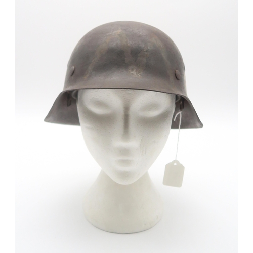 409 - A WW2 German Third Reich M42 stahlhelm steel helmet, stamped 