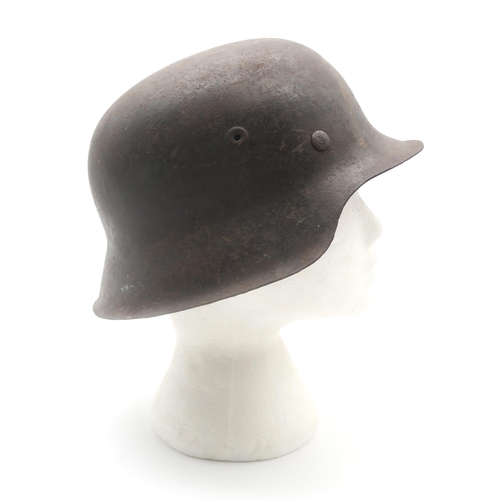 409 - A WW2 German Third Reich M42 stahlhelm steel helmet, stamped 