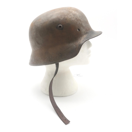 410 - A WW2 German Third Reich M40 stahlhelm steel helmet, stamped internally 