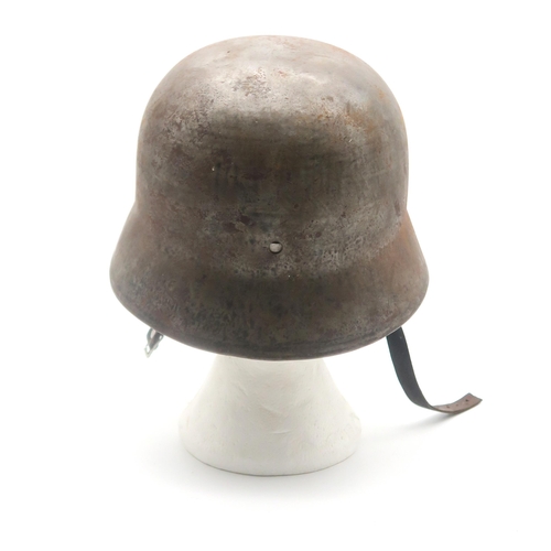 410 - A WW2 German Third Reich M40 stahlhelm steel helmet, stamped internally 