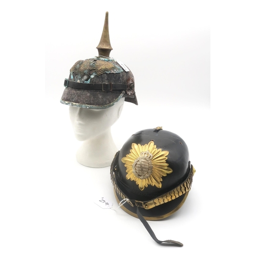 412 - A Prussian Garde du Corps other ranks pickelhaube, in relic condition; together with a partial repro... 