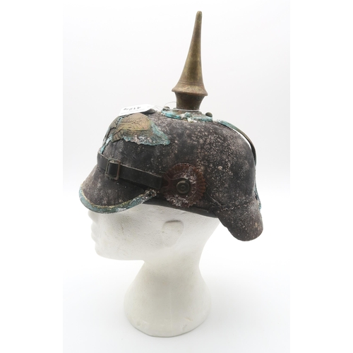 412 - A Prussian Garde du Corps other ranks pickelhaube, in relic condition; together with a partial repro... 