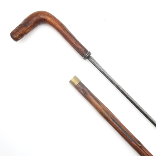 419 - A sword stick, the approx. 68cm blade by Wilkinson of 27 Pall Mall, the handled carved 