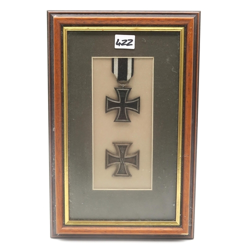 422 - A WW1 Imperial German Prussian pilot's badge, mounted in a glazed frame alongside an armband printed... 