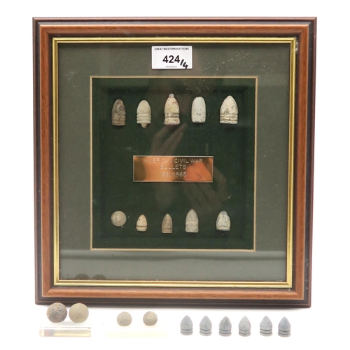 424 - A cased display of American Civil War Bullets, supplied by James H. Cohen & Sons Inc. of New Orl... 