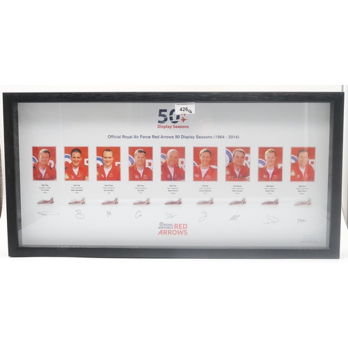 426 - A framed display commemorating the Royal Air Force Red Arrows' 50 Display Seasons, 1964-2014, signed... 