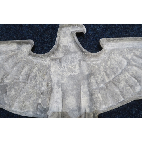 428 - A German Third Reich aluminium alloy wall Reichsadler (eagle), stamped verso 