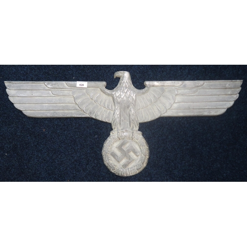 428 - A German Third Reich aluminium alloy wall Reichsadler (eagle), stamped verso 