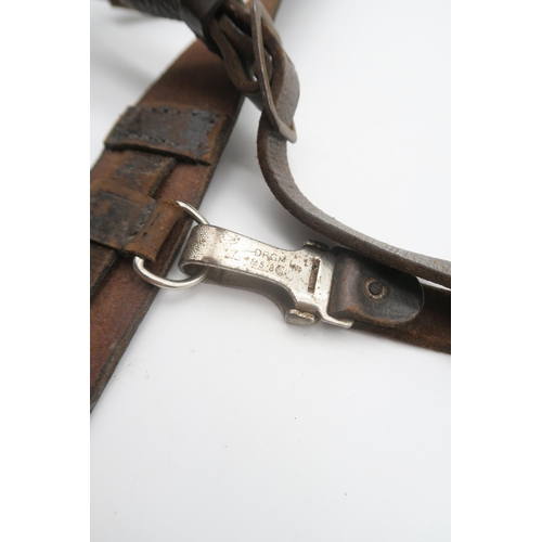 434 - A collection of military leather belts, some being in the Sam Browne style, to include German exampl... 