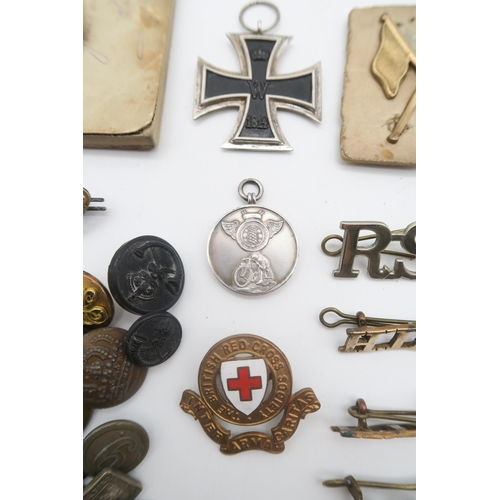 435 - A WW1 Imperial German Iron Cross, with stamped suspension ring; a motorcycling fob medal engraved ve... 