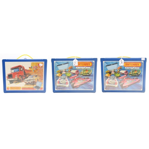 477 - Three Matchbox Carry Cases, each holding forty-eight vehicles (3)