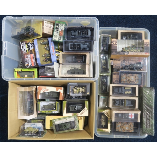 482 - A large quantity of packaged scale model military vehicles, to include examples by atlas Editions, S... 