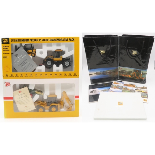 487 - Two JCB Millennium commemorative model packs, together with three various JCB commemorative publicat... 