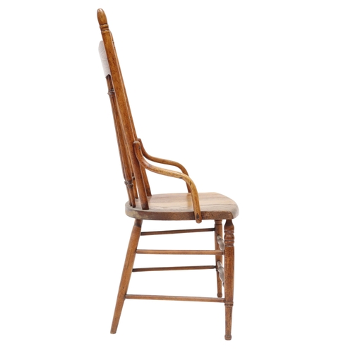 2019A - A LATE 19TH CENTURY AMERICAN OAK RAIL BACK ARMCHAIRWith turned rail back over shaped seat flanked by... 