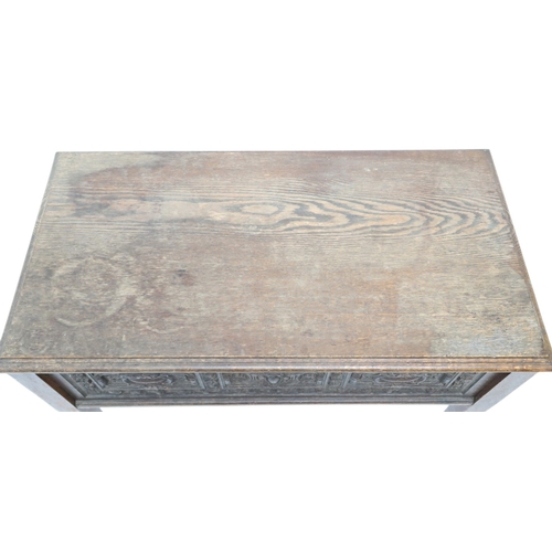 2007A - A 19TH CENTURY OAK SIDE TABLEWith rectangular hinged top over carved friezes on square tapering supp... 