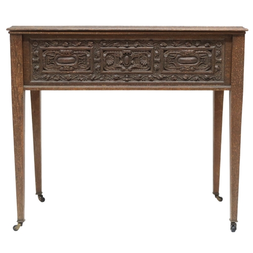 2007A - A 19TH CENTURY OAK SIDE TABLEWith rectangular hinged top over carved friezes on square tapering supp... 