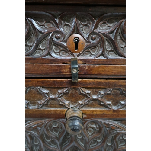 2011A - A 19TH CENTURY CONTINENTAL STYLE WALNUT SECRETAIRE ABATTANTWith extensively carved front with single... 