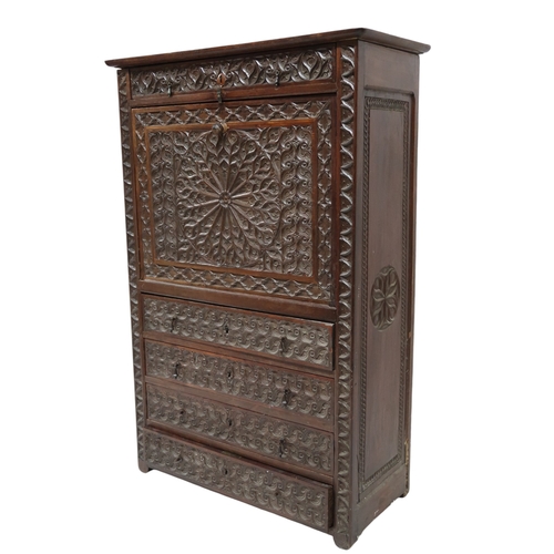 2011A - A 19TH CENTURY CONTINENTAL STYLE WALNUT SECRETAIRE ABATTANTWith extensively carved front with single... 