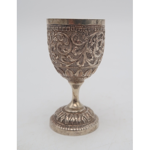 2505 - A PERSIAN WHITE METAL CHALICE AND STANDof slightly flaring form, the body partly fluted, engraved wi... 