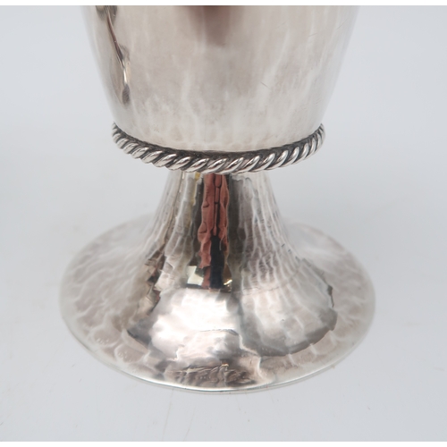 2506 - GARRARD & CO;a set of four George V silver chalices, London 1932 / 33, of flaring form, the bodi... 