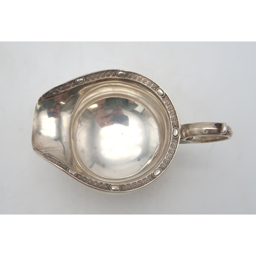 2508 - A GEORGE V FOUR PIECE SILVER TEA SERVICEby Charles Boyton, London 1928, of squat spherical form, wit... 