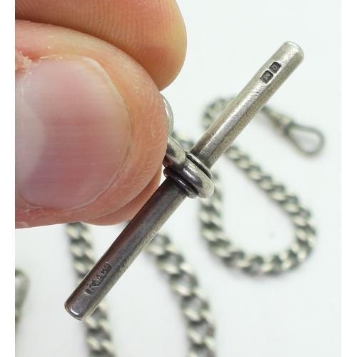 9002 - A heavy silver tapered fob chain, at widest point 10mm, length 38cm, with attached silver double sid... 