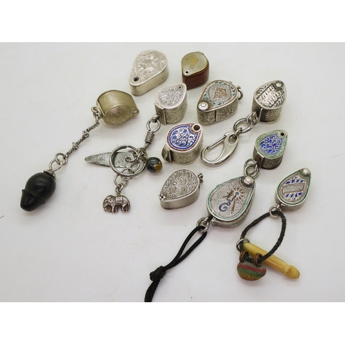 9006 - Nine white metal cased loopes, four with enamel, all with hand engraved decoration, two hand ca... 