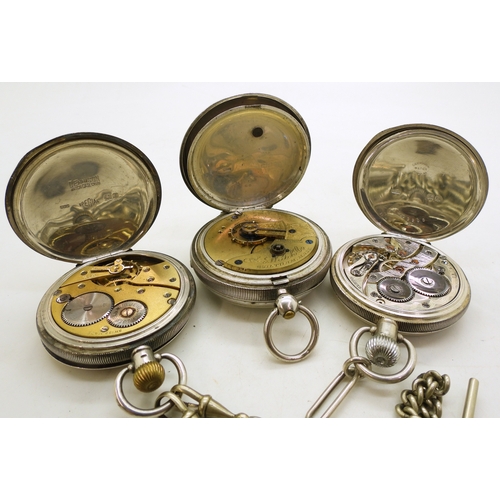 9007 - Three silver pocket watches. A Waltham open face pocket watch, movement 10666066, case with UK hallm... 