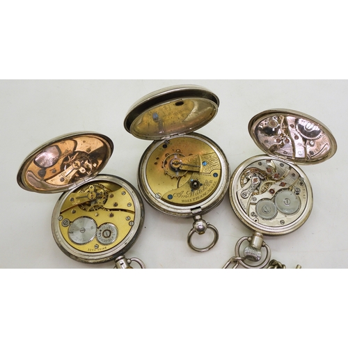 9007 - Three silver pocket watches. A Waltham open face pocket watch, movement 10666066, case with UK hallm... 