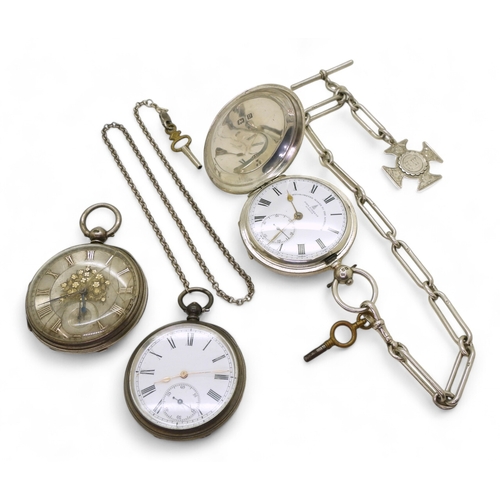 9009 - Three silver cased pocket watches. A John Forrest full hunter with a 30cm silver decorative fob chai... 