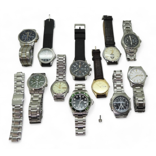 9027 - A collection of fashion watches (11) Please note, this lot is sold as seen, it contains replicas.