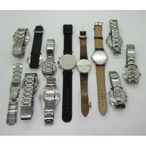 9027 - A collection of fashion watches (11) Please note, this lot is sold as seen, it contains replicas.