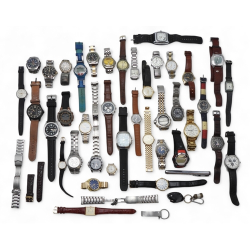 9030 - A large collection of fashion watches Please note, this lot is sold as seen, it contains replicas.