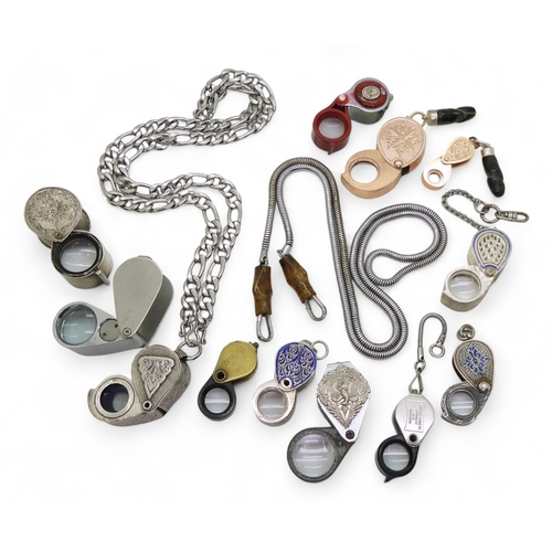 9032 - Twelve jewellers loopes to include white metal enamelled examples, engraved examples and two with at... 