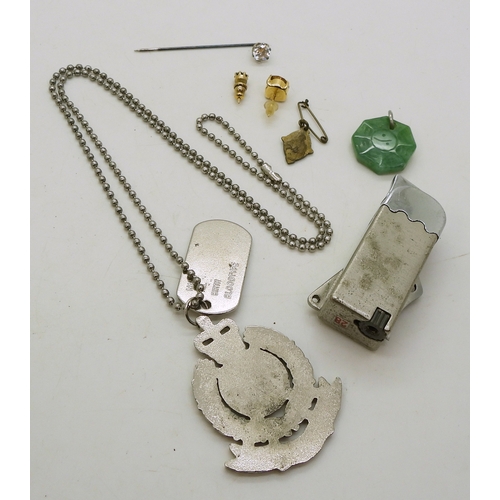 9037 - Eight jewellers loopes, some in enamelled and engraved white metal, with attached charms, chains etc... 