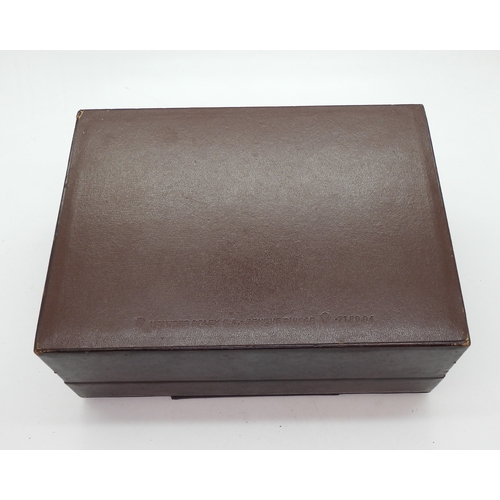 9040 - A brown leather Rolex watch box, with gold coloured buckle, wood clad interior , stamped Creation Ge... 