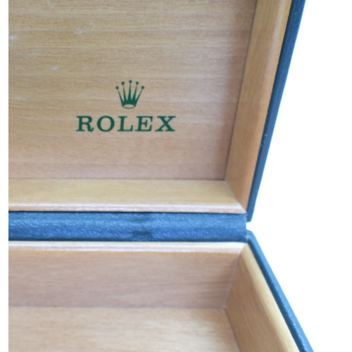 9041 - Two boxes marked Rolex. A green leatherette box with wood clad interior, signed in green Rolex, with... 