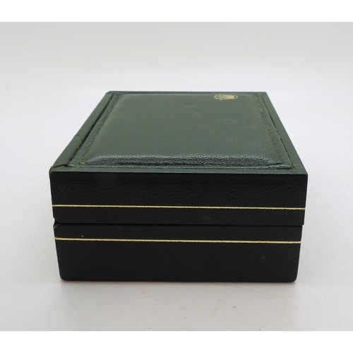 9041 - Two boxes marked Rolex. A green leatherette box with wood clad interior, signed in green Rolex, with... 