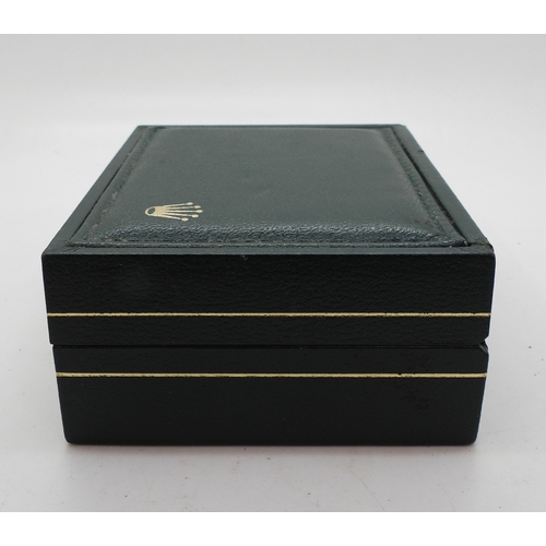 9041 - Two boxes marked Rolex. A green leatherette box with wood clad interior, signed in green Rolex, with... 