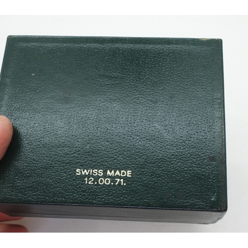 9041 - Two boxes marked Rolex. A green leatherette box with wood clad interior, signed in green Rolex, with... 