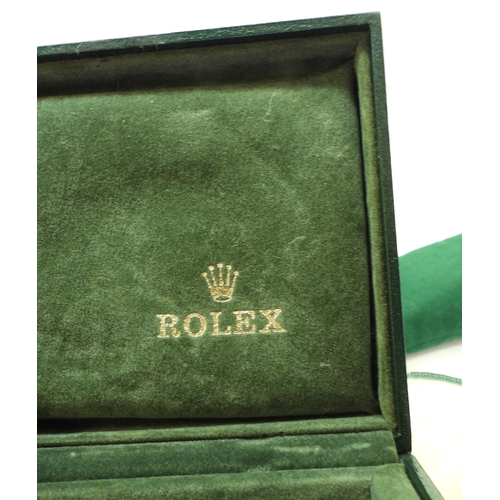 9041 - Two boxes marked Rolex. A green leatherette box with wood clad interior, signed in green Rolex, with... 