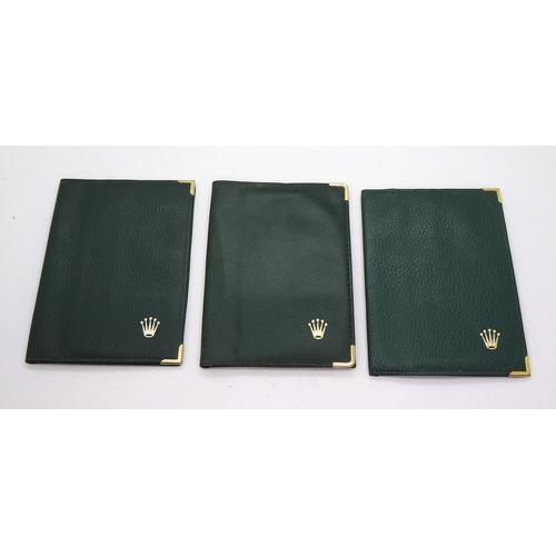 9042 - Four watch boxes signed Rolex. A green leatherette box, top stitched, with Rolex crown logo in gold ... 