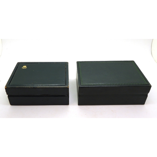 9042 - Four watch boxes signed Rolex. A green leatherette box, top stitched, with Rolex crown logo in gold ... 