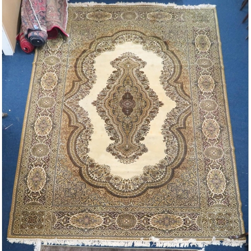 114 - A large ivory ground Bijar style rug with mustard floral/foliate central medallion and spandrels wit... 