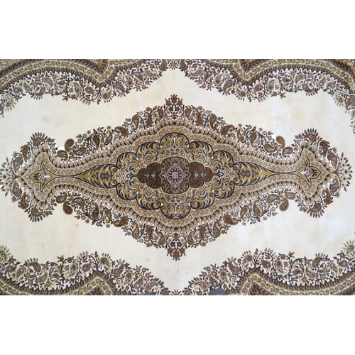 114 - A large ivory ground Bijar style rug with mustard floral/foliate central medallion and spandrels wit... 