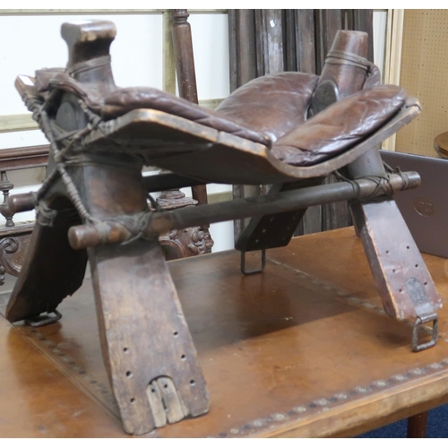 127 - A 20th century leather seated camel saddle