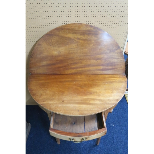 128 - A 19th century mahogany demi lune fold-over tea table with single drawer on square tapering supports... 