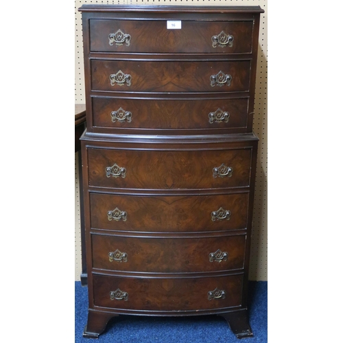 16 - A 20th century mahogany bow front chest on chest with three over four drawers on bracket feet, 109cm... 