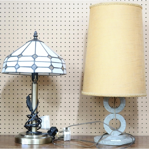 17 - A lot comprising a 20th century metallic based table lamp with Tiffany style shade and another stone... 