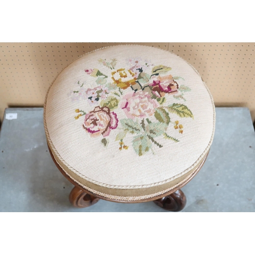 51 - A 19th century rosewood stool with circular tapestry upholstered seat on shaped base, 44cm high x 40... 